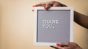 Picture of a letter board with "Thank You" written on it.